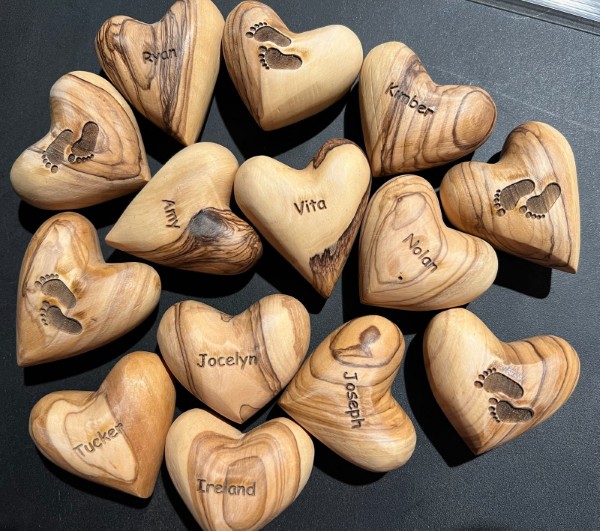 Laser engraved olive wood hearts baby feet and names